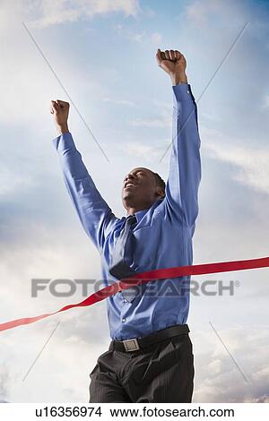 Picture - Businessman winning a race. Fotosearch