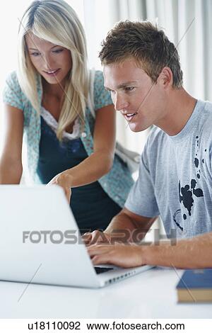 College students looking at laptop View Large Photo Image Stock Image - College students looking at laptop. Fotosearch