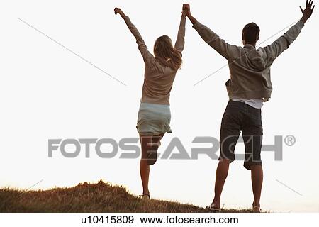 Couple holding hands View Large Photo Image Stock Photo - Couple holding hands. Fotosearch