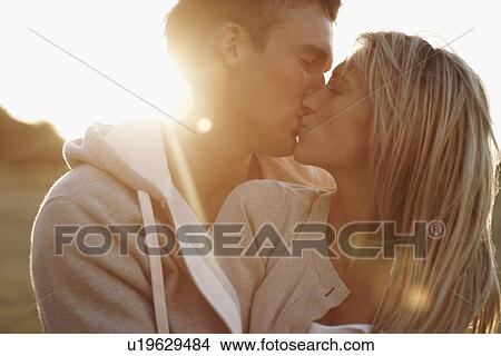 Picture - Couple kissing. Fotosearch