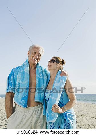 Couple on beach View Large Photo Image Picture - Couple on beach. Fotosearch