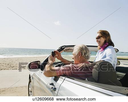 Stock Photo - Couple on road trip. Fotosearch
