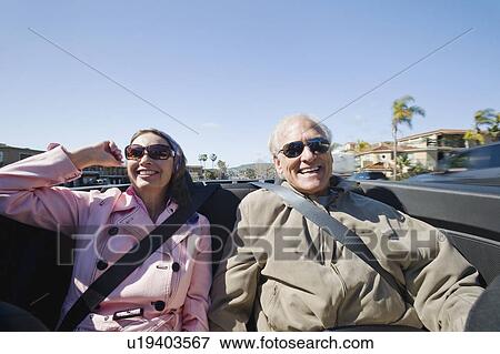 Stock Photo - Couple on road trip. Fotosearch