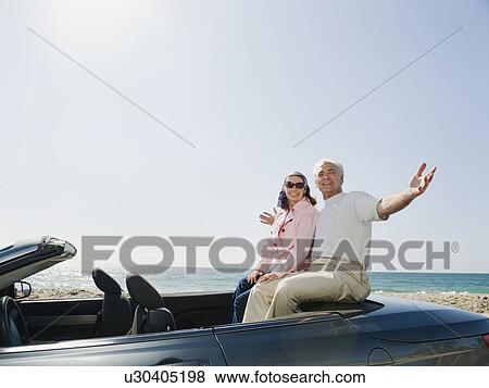 Couple on road trip View Large Photo Image Stock Photo - Couple on road trip. Fotosearch