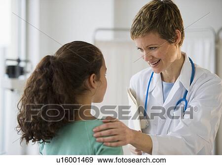 Doctor and patient in pediatrician's office View Large Photo Image Stock Photo - Doctor and patient in pediatrician's office. Fotosearch