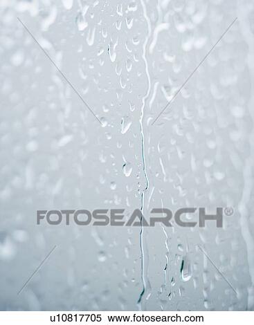 Drops of rain on window View Large Photo Image Stock Photography - Drops of rain on window. Fotosearch