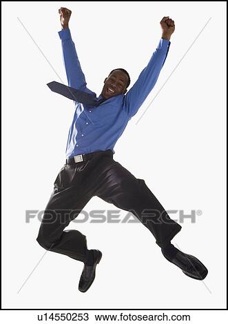 Excited businessman jumping View Large Photo Image Stock Image - Excited businessman jumping. Fotosearch
