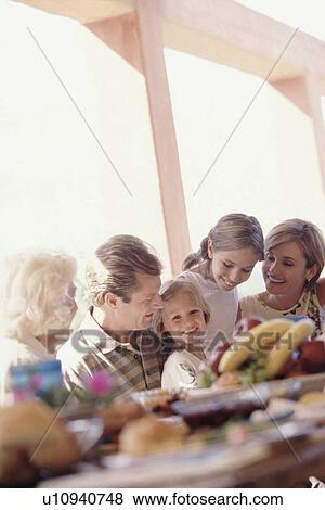 Family having a picnic View Large Photo Image Stock Photo - Family having a picnic. Fotosearch