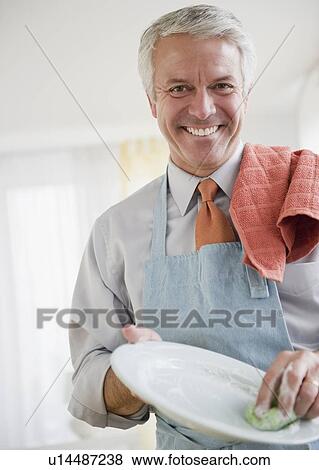 Father washing dishes View Large Photo Image Stock Photo - Father washing dishes. Fotosearch