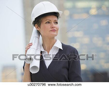 Stock Photograph - Female architect on construction site. Fotosearch