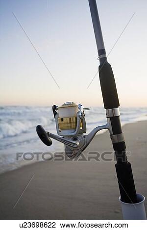 Fishing pole on the beach View Large Photo Image Stock Image - Fishing pole on the beach. Fotosearch