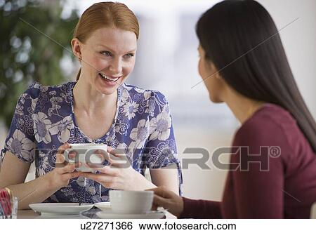 Stock Photograph - Friends drinking coffee. Fotosearch