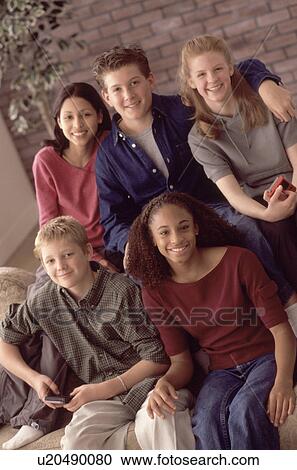 Friends hanging out together View Large Photo Image Stock Image - Friends hanging out together. Fotosearch