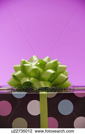 Stock Image - Green bow on a gift. Fotosearch