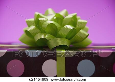 Stock Photo - Green bow on a gift. Fotosearch