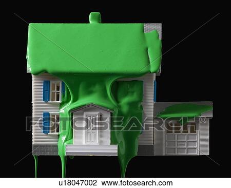 Stock Image - Green paint on a model home. Fotosearch