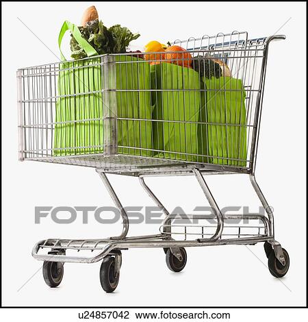 Grocery cart full of bagged produce View Large Photo Image Stock Image - Grocery cart full of bagged produce. Fotosearch