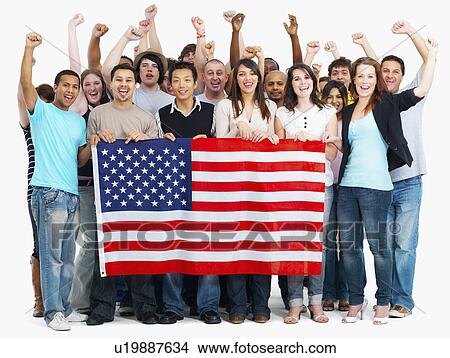 Group of people holding American flag View Large Photo Image Picture - Group of people holding American flag. Fotosearch