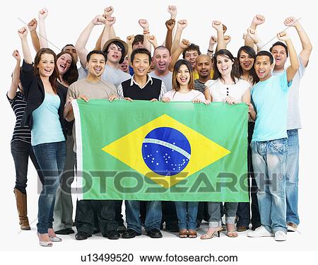 Group of people holding flag View Large Photo Image Stock Image - Group of people holding flag. Fotosearch