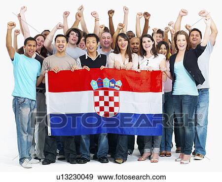 Group of people holding flag View Large Photo Image Stock Photo - Group of people holding flag. Fotosearch