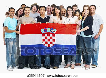 Stock Photo - Group of people holding flag. Fotosearch