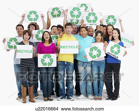 Picture - Group of people holding recycle signs. Fotosearch