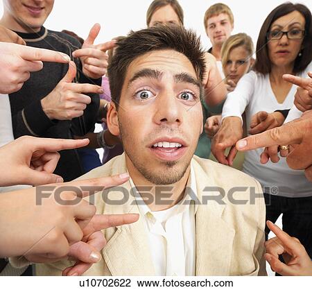 Group of people pointing at one person Stock Image | u10702622 | Fotosearch