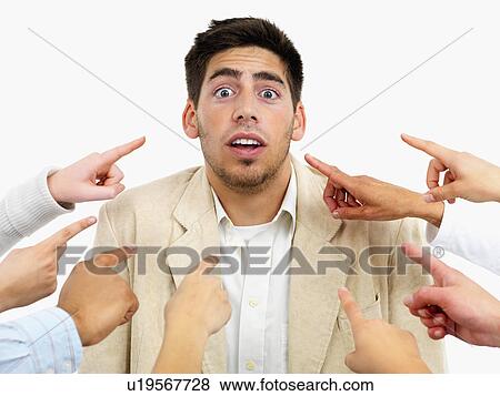 Hands pointing at man View Large Photo Image Stock Photo - Hands pointing at man. Fotosearch