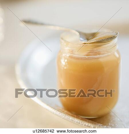 Stock Image - Jar of apple sauce. Fotosearch
