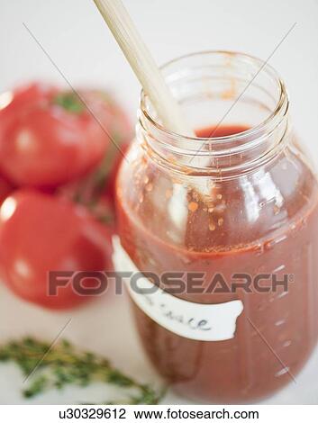 Jar of tomato sauce View Large Photo Image Stock Image - Jar of tomato sauce. Fotosearch