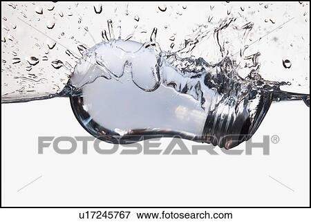 Light bulb floating in water View Large Photo Image Stock Photo - Light bulb floating in water. Fotosearch