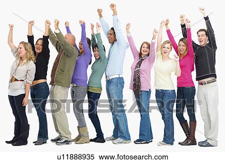 Stock Photography - Line of people with their arms in the air. Fotosearch
