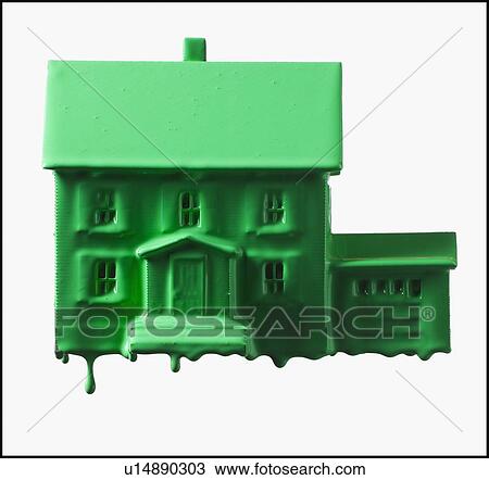 Stock Image - Model home covered in green paint. Fotosearch
