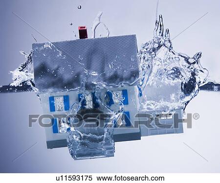 Model home sinking in water View Large Photo Image Stock Photography - Model home sinking in water. Fotosearch