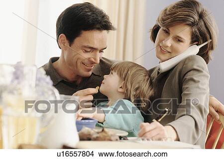 Multi tasking mother View Large Photo Image Picture - Multi tasking mother. Fotosearch