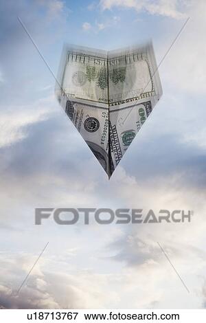Paper airplane made out of money View Large Photo Image Stock Photo - Paper airplane made out of money. Fotosearch