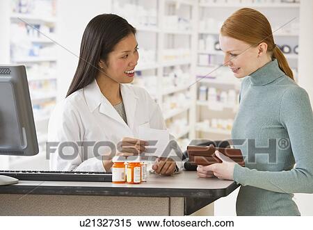 Stock Photography - Pharmacist and customer. Fotosearch