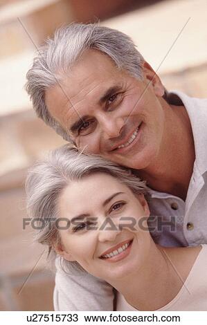 Portrait of a happy couple View Large Photo Image Stock Image - Portrait of a happy couple. Fotosearch