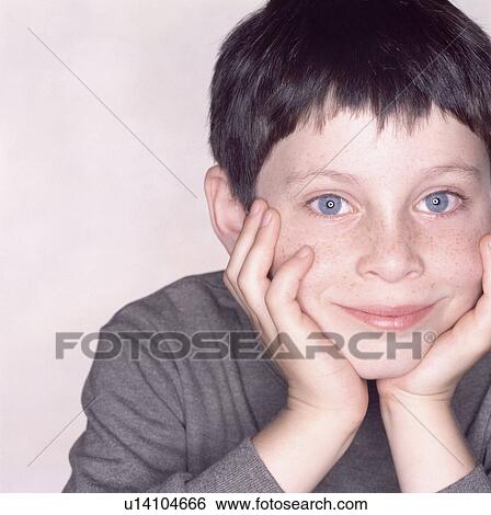 Stock Photograph - Portrait of a young boy. Fotosearch