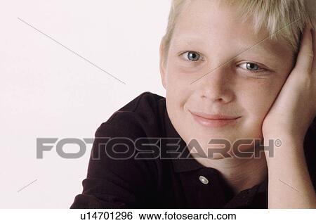 Portrait of a young boy View Large Photo Image Stock Photograph - Portrait of a young boy. Fotosearch