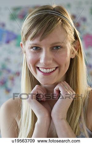 Stock Photo - Portrait of a young woman. Fotosearch