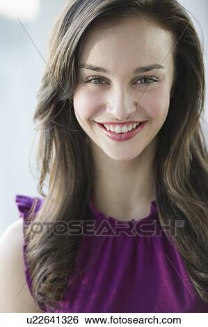 Stock Photograph - Portrait of a young woman. Fotosearch