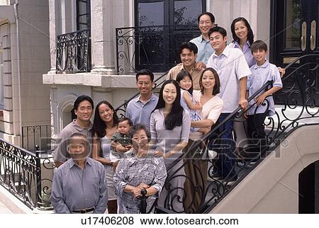 Stock Photo - Portrait of extended family. Fotosearch