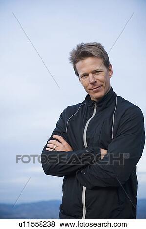 Stock Photo - Portrait of trail runner. Fotosearch