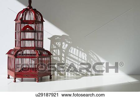 Stock Image - Red bird cage. Fotosearch