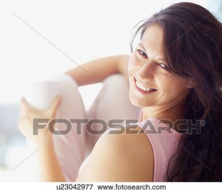 Stock Photo - Relaxed woman. Fotosearch