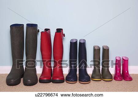 Row of rubber boots View Large Photo Image Picture - Row of rubber boots. Fotosearch