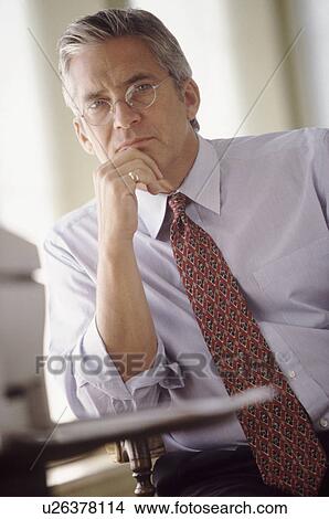 Serious businessman View Large Photo Image Picture - Serious businessman. Fotosearch