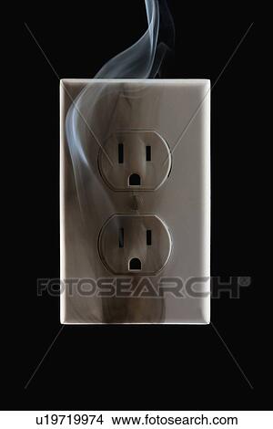 Smoke emanating from an electrical outlet View Large Photo Image Picture - Smoke emanating from an electrical outlet. Fotosearch