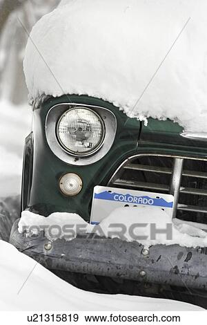 Snow covered car View Large Photo Image Stock Photo - Snow covered car. Fotosearch